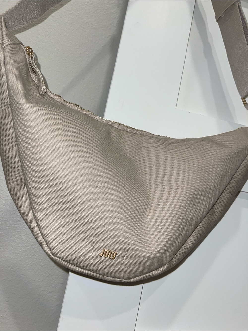 Branded Cream Crescent Shoulder Bag